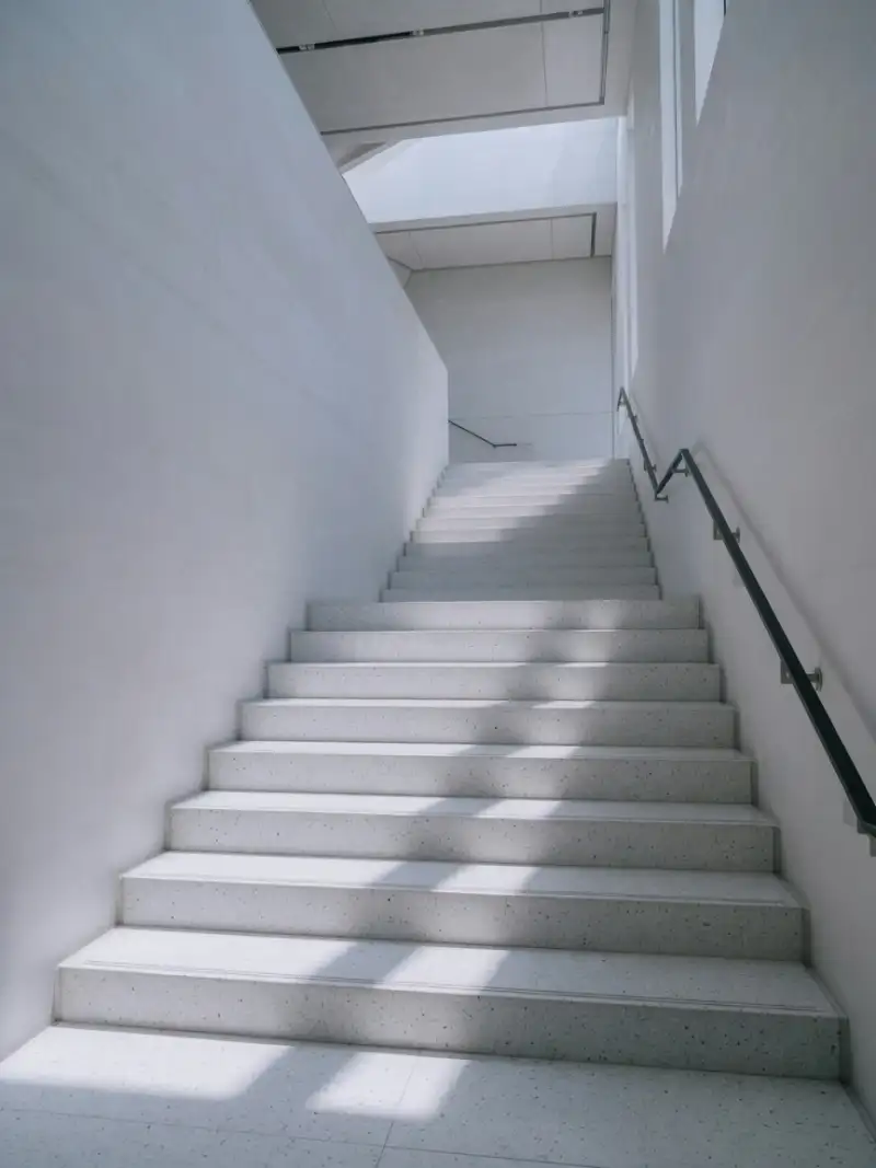 Gallery stairwell in cool daylight